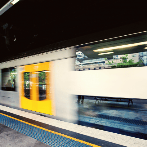 Sydney train passing by station