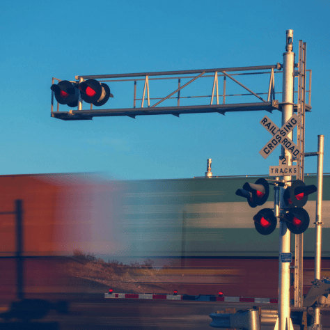 Freight train passing through signal