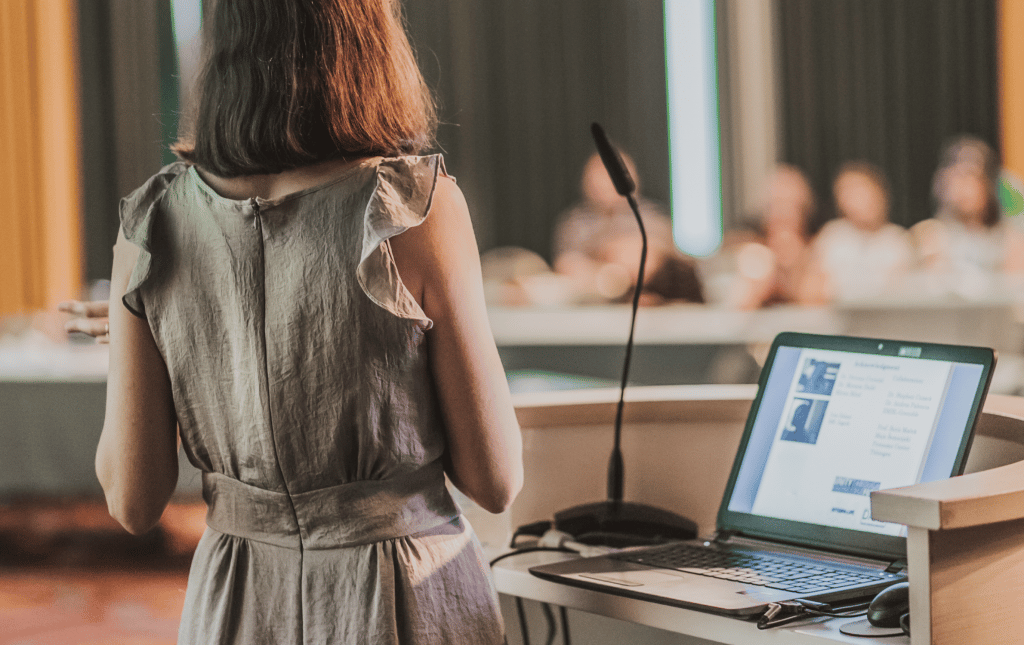 Woman presenting to audience