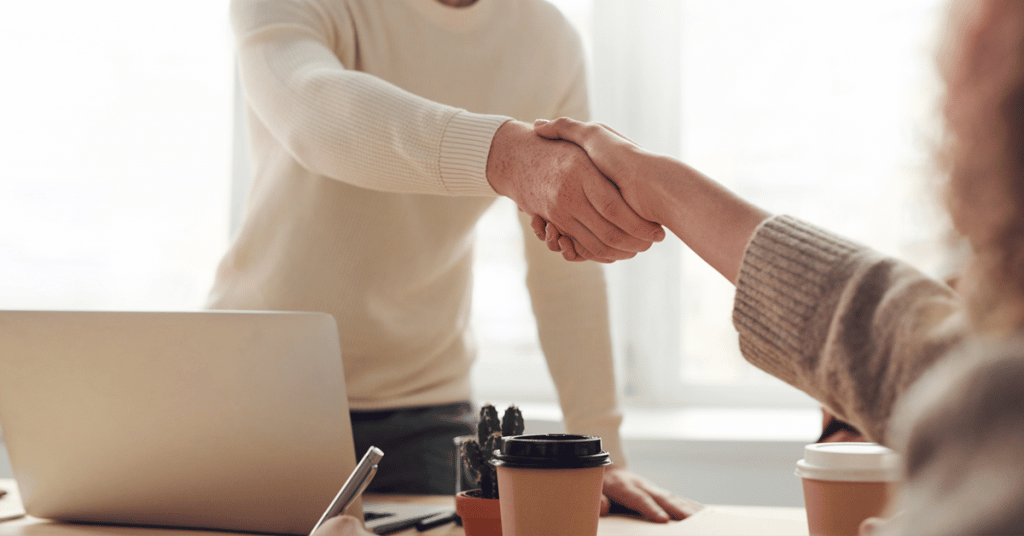 Two people shaking hands