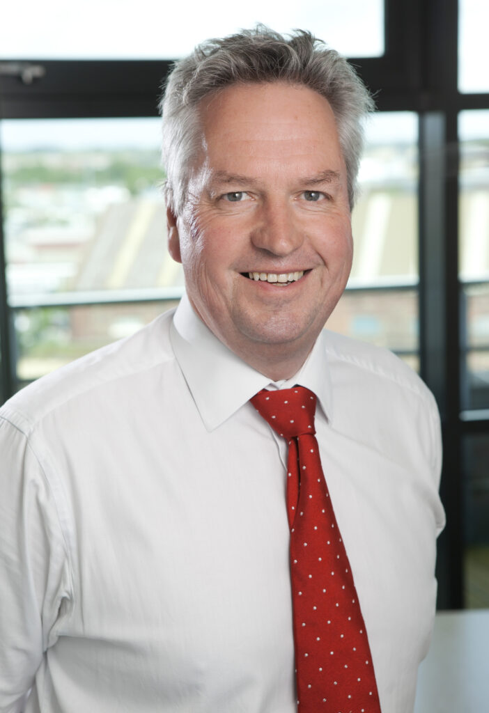 Craig Scott SYSTRA standing by winodw