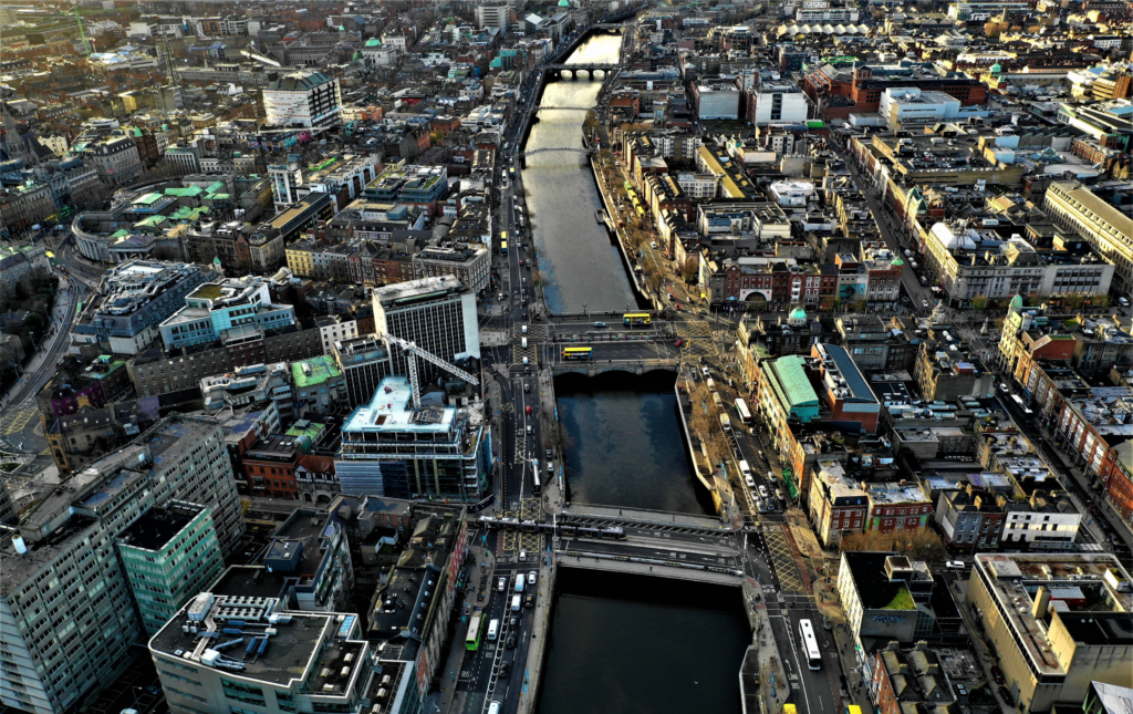 A birds eye view photo of the city of Dublin, Ireland. The River Liffey is pictured running through the centre of the photo.
