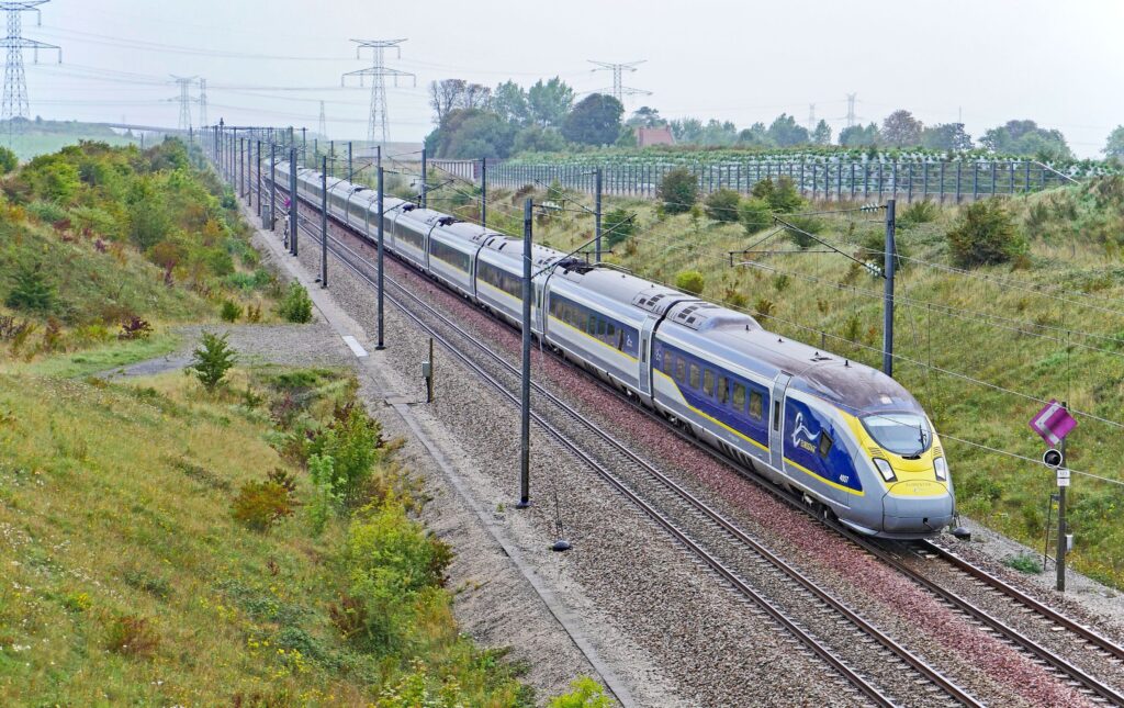 High speed Eurostar train traveling through countryside