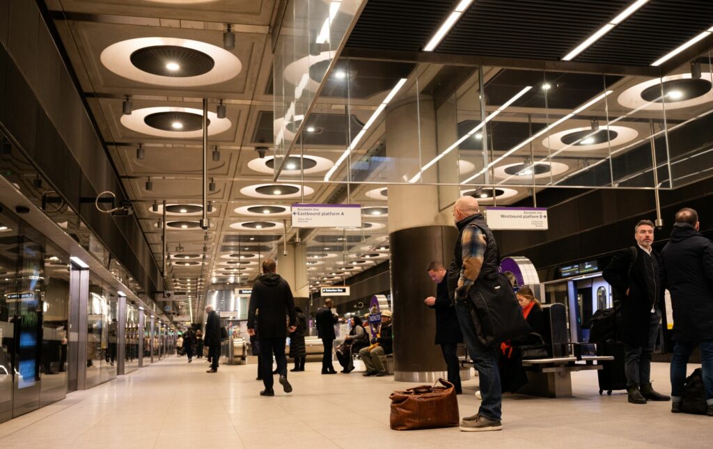 Passengers on the platform at Elizabeth Line station