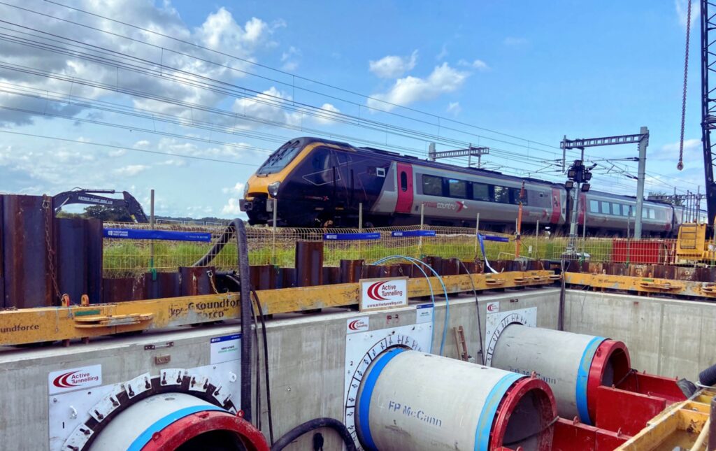 Cross Country train travelling over tunnelling work