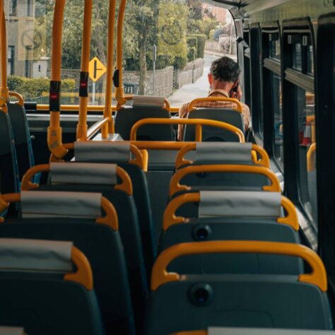 man sat on bus